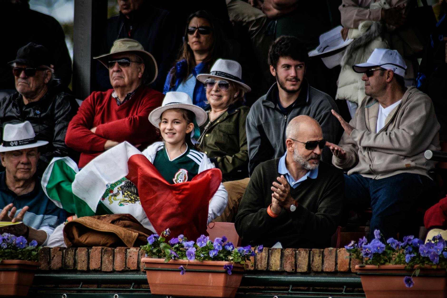 A diverse crowd enjoying a lively outdoor celebration in Montevideo, Uruguay.