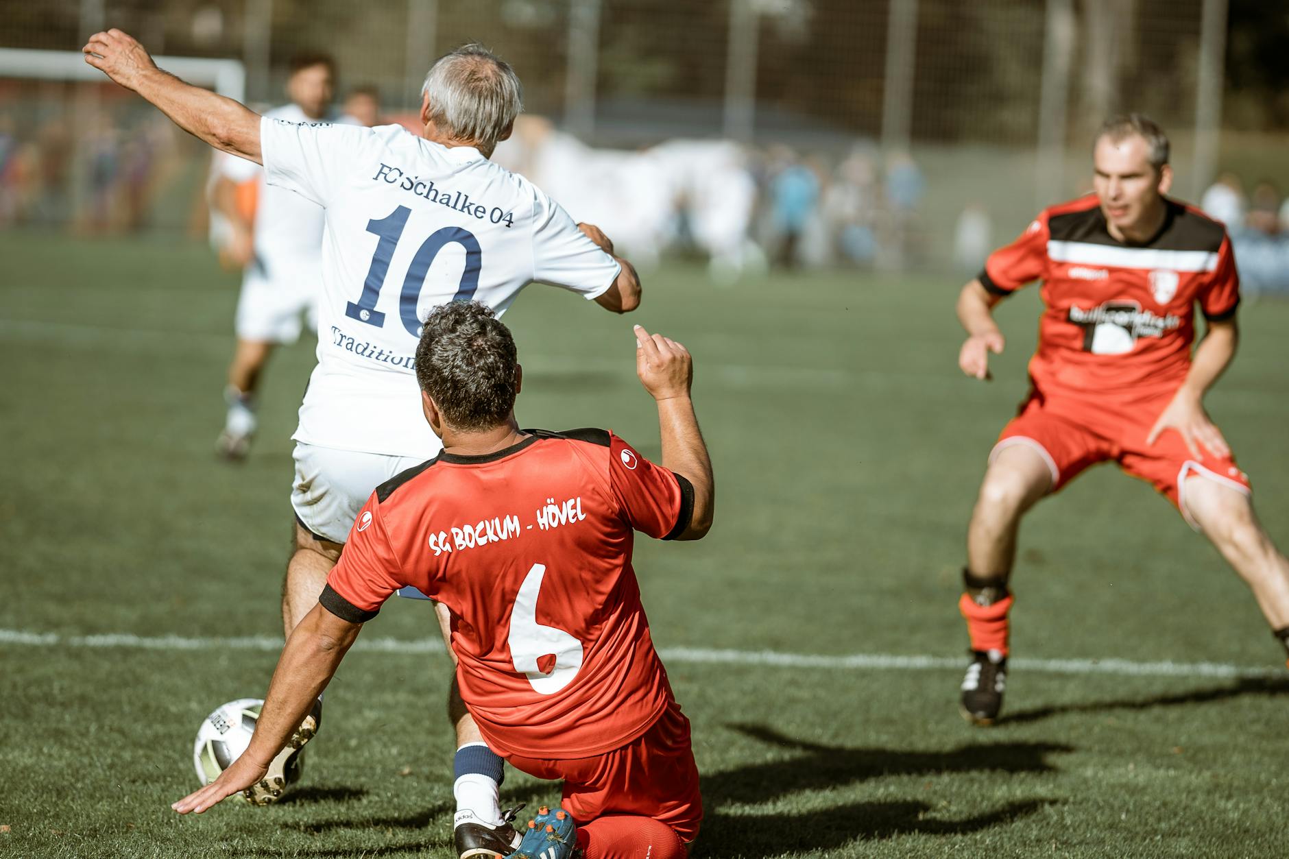 Dynamic soccer match photo showcasing intense gameplay and teamwork on the field.