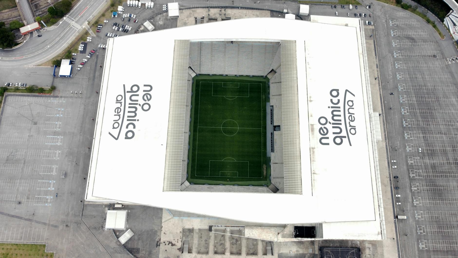 Drone shot capturing the iconic Neo Química Arena stadium in São Paulo, Brazil.