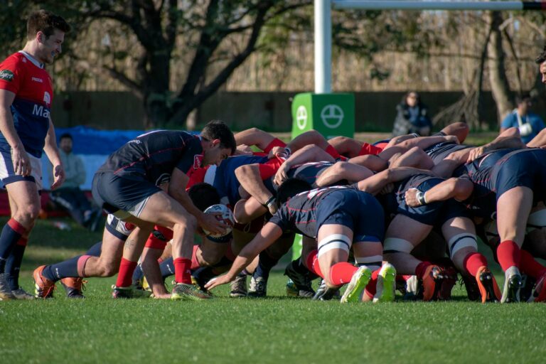 Intense rugby match with players engaged in a scrum in Buenos Aires, Argentina.