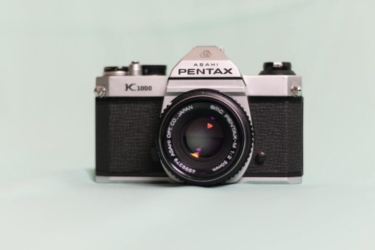 Detailed photo of a vintage Asahi Pentax K1000 camera showcasing its classic design and lens.