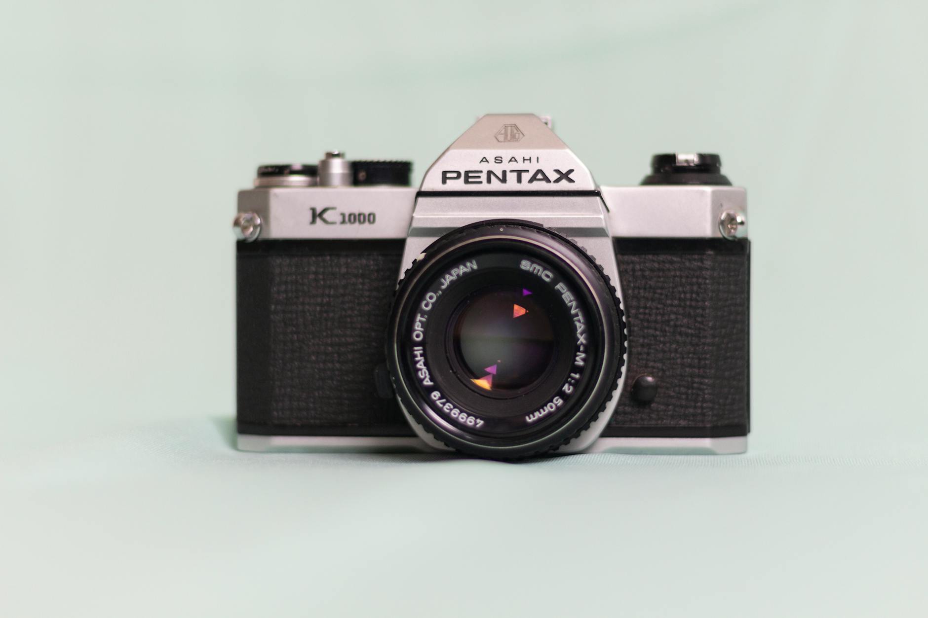 Detailed photo of a vintage Asahi Pentax K1000 camera showcasing its classic design and lens.