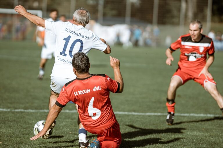Dynamic soccer match photo showcasing intense gameplay and teamwork on the field.