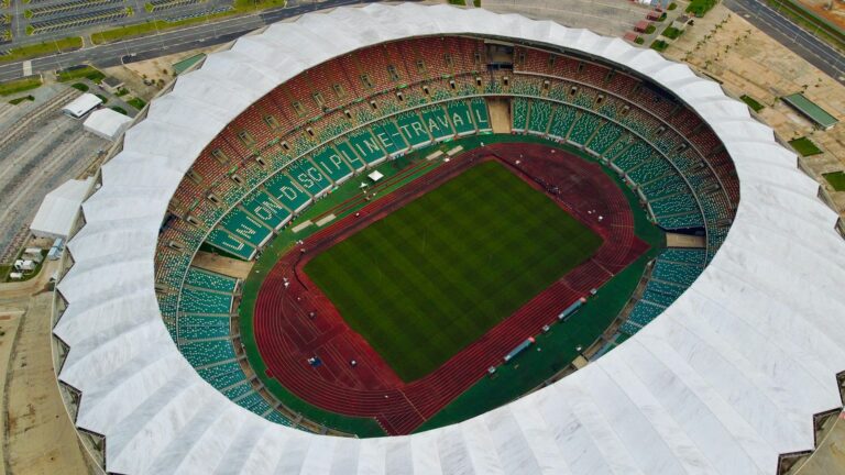 Aerial drone view of Alassane Ouattara Stadium, a modern sports arena in Ivory Coast.