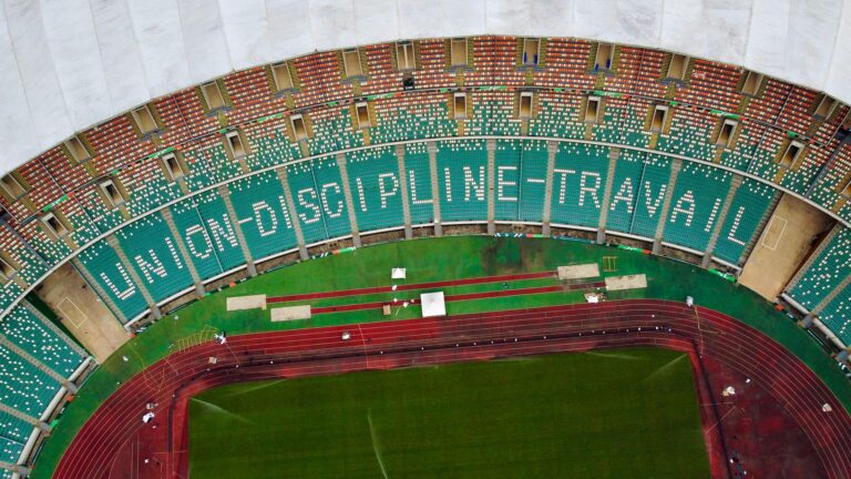 Aerial view of Alassane Ouattara Stadium in Côte d'Ivoire with empty grandstands.