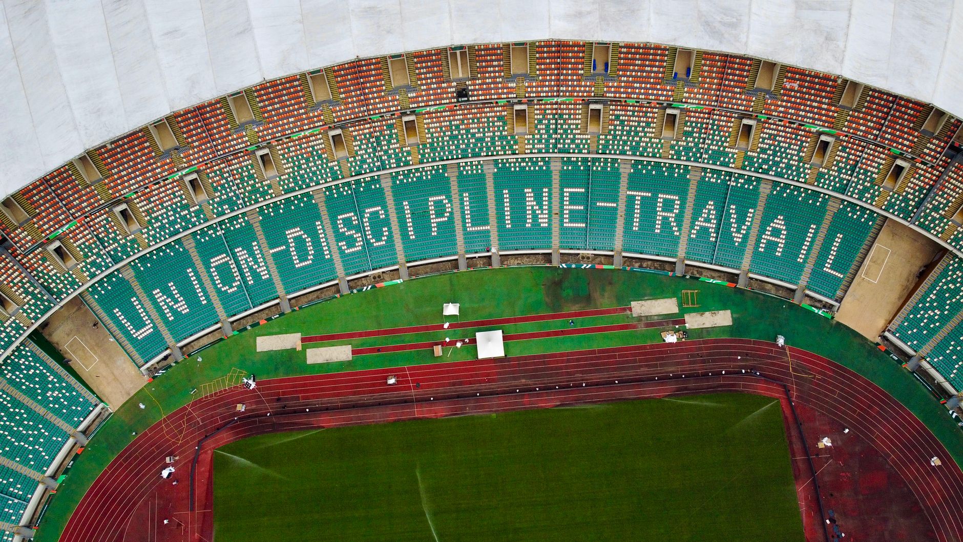 Aerial view of Alassane Ouattara Stadium in Côte d'Ivoire with empty grandstands.