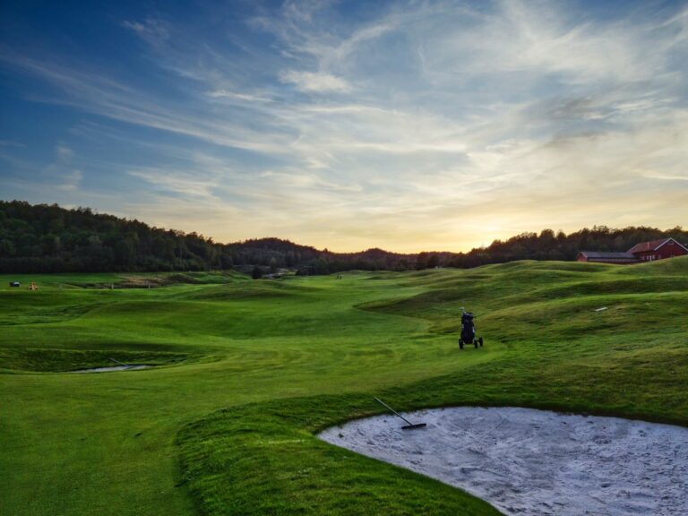 Beautiful golf course landscape in Solhem, Sweden during a picturesque sunset.