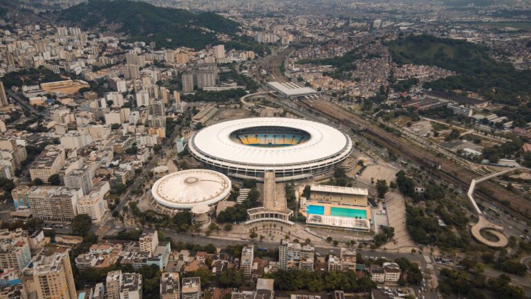 Aerial shot of the iconic Maracanã Stadium in bustling Rio de Janeiro, Brazil.