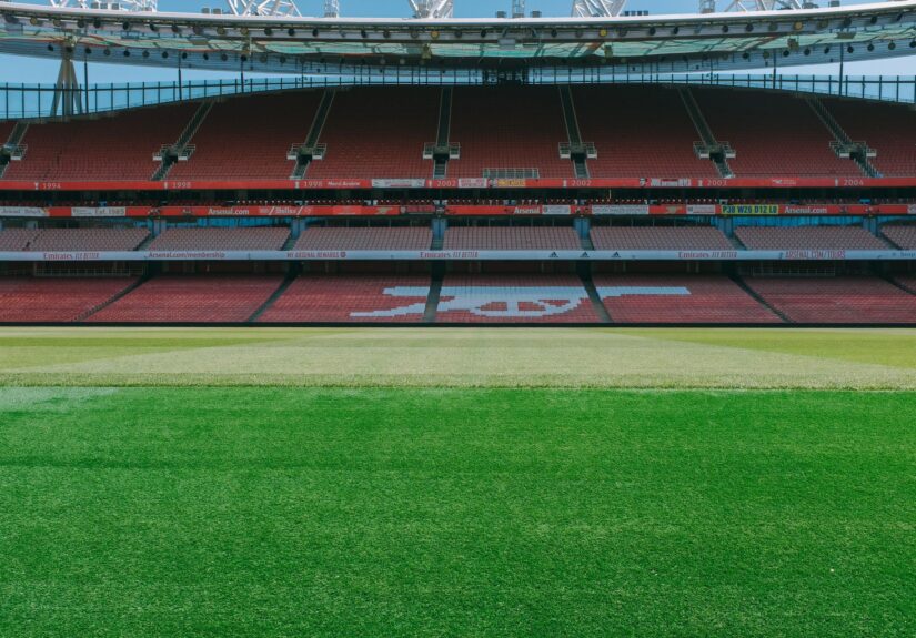 A view of the empty stands and football pitch at Emirates Stadium, London.