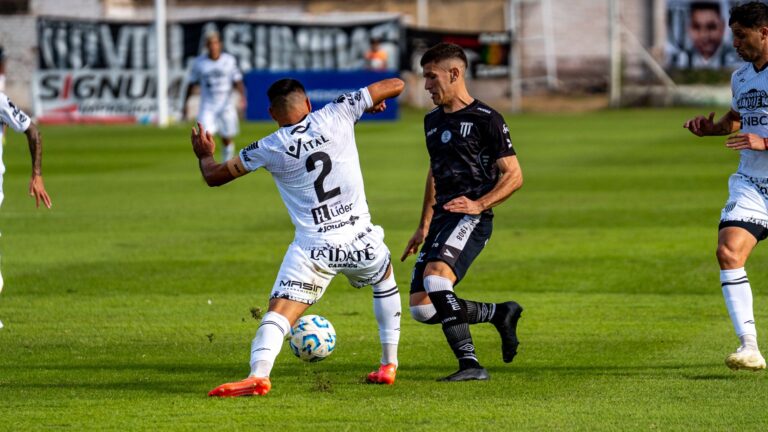 Action-packed soccer match with players in motion on a green field.