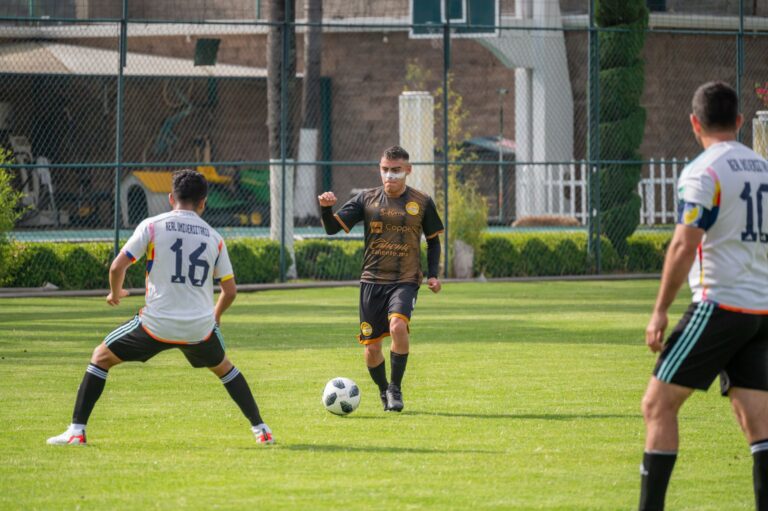 Intense soccer match with players in action in Texcoco, México.