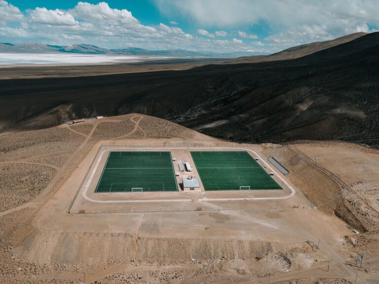 A striking aerial view of soccer fields in the remote desert landscape of Olaroz Chico, Jujuy, Argentina.