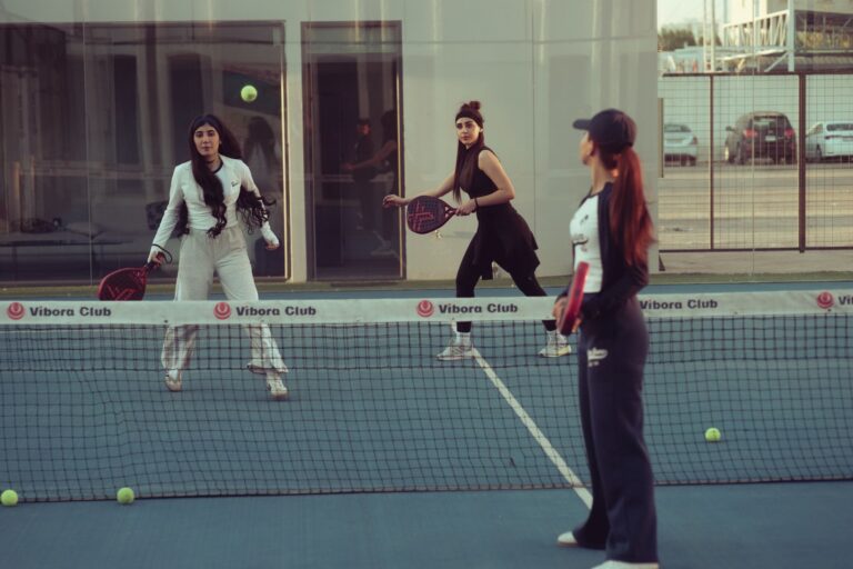 Women engaged in a padel tennis match at Vibora Club, Baghdad, Iraq.