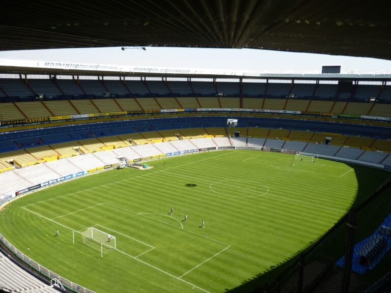 Spacious soccer stadium with green field in Jalisco del Refugio, Mexico.