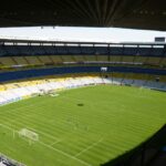 Spacious soccer stadium with green field in Jalisco del Refugio, Mexico.