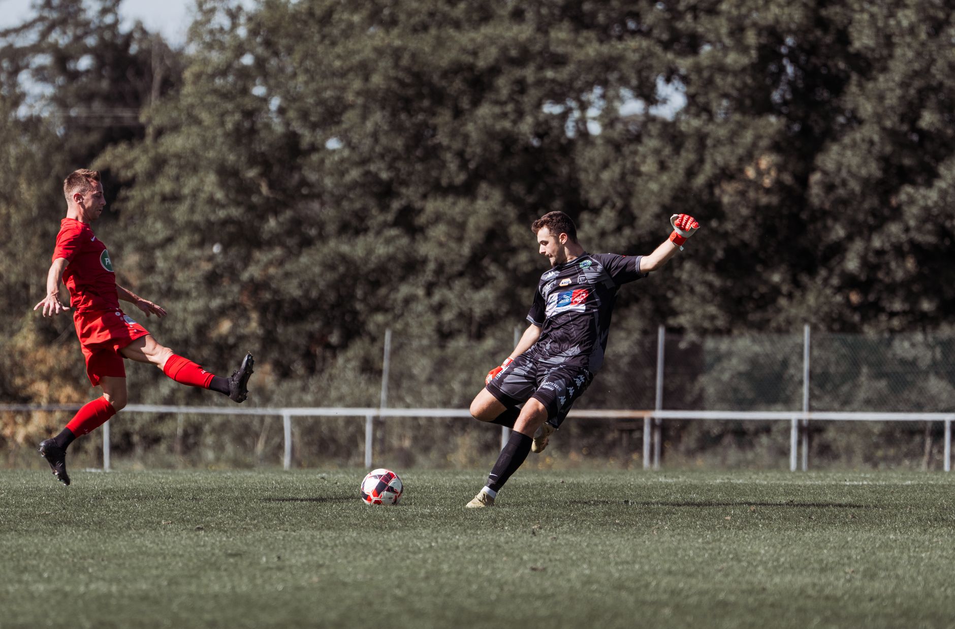 Dynamic soccer match action featuring players in France, showcasing athleticism and competition.