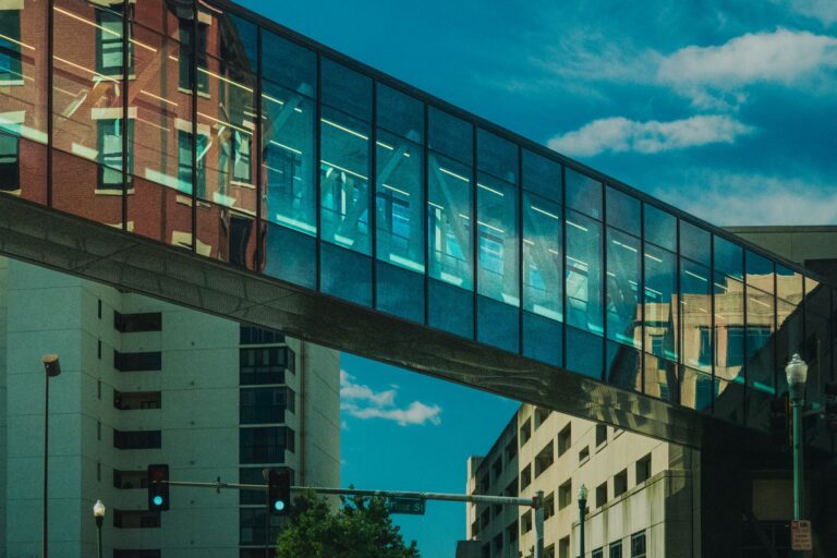 Glass skybridge connecting buildings with reflections in Memphis, Tennessee.