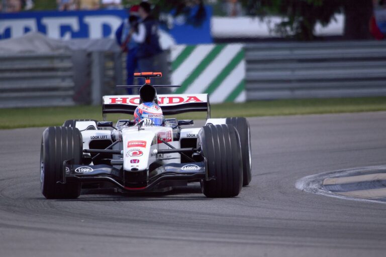 Honda Formula 1 racecar on track during Indianapolis Motor Speedway event.