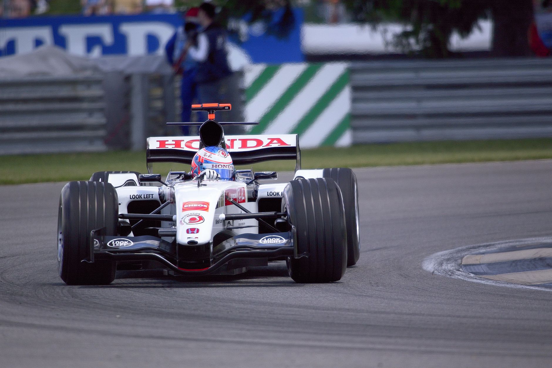 Honda Formula 1 racecar on track during Indianapolis Motor Speedway event.